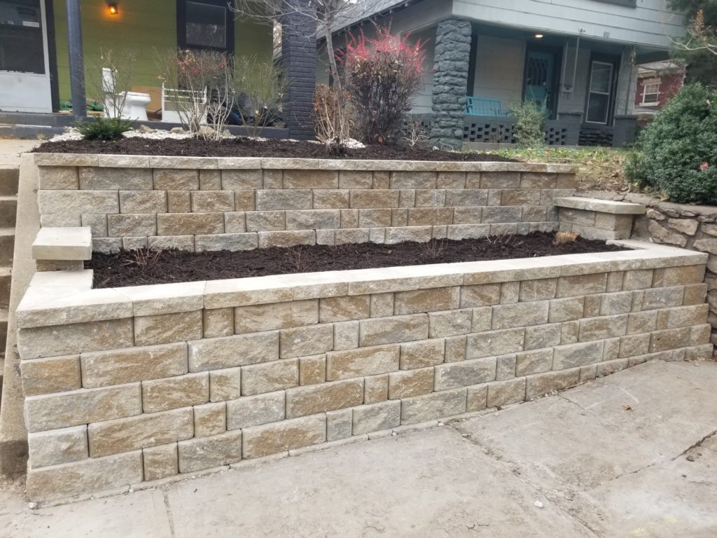 Retaining wall after Evolving Landscapes repaired it