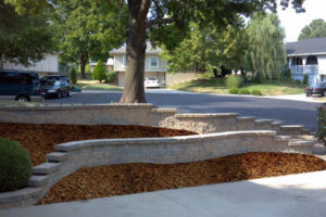 Curved retaining wall done by Evolving Landscapes in Lee's Summit, MO